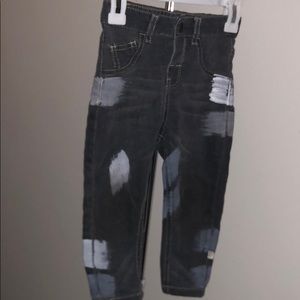 Pope baby jeans. Faded back and white.